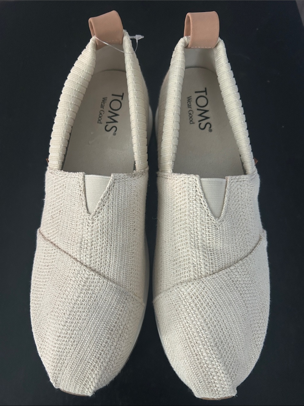 TOMS woman’s Slip-On Loafers in Cream with Tan Heel Tab
